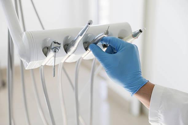 Professional Tooth Extraction technician working in Fox Farm-College, WY